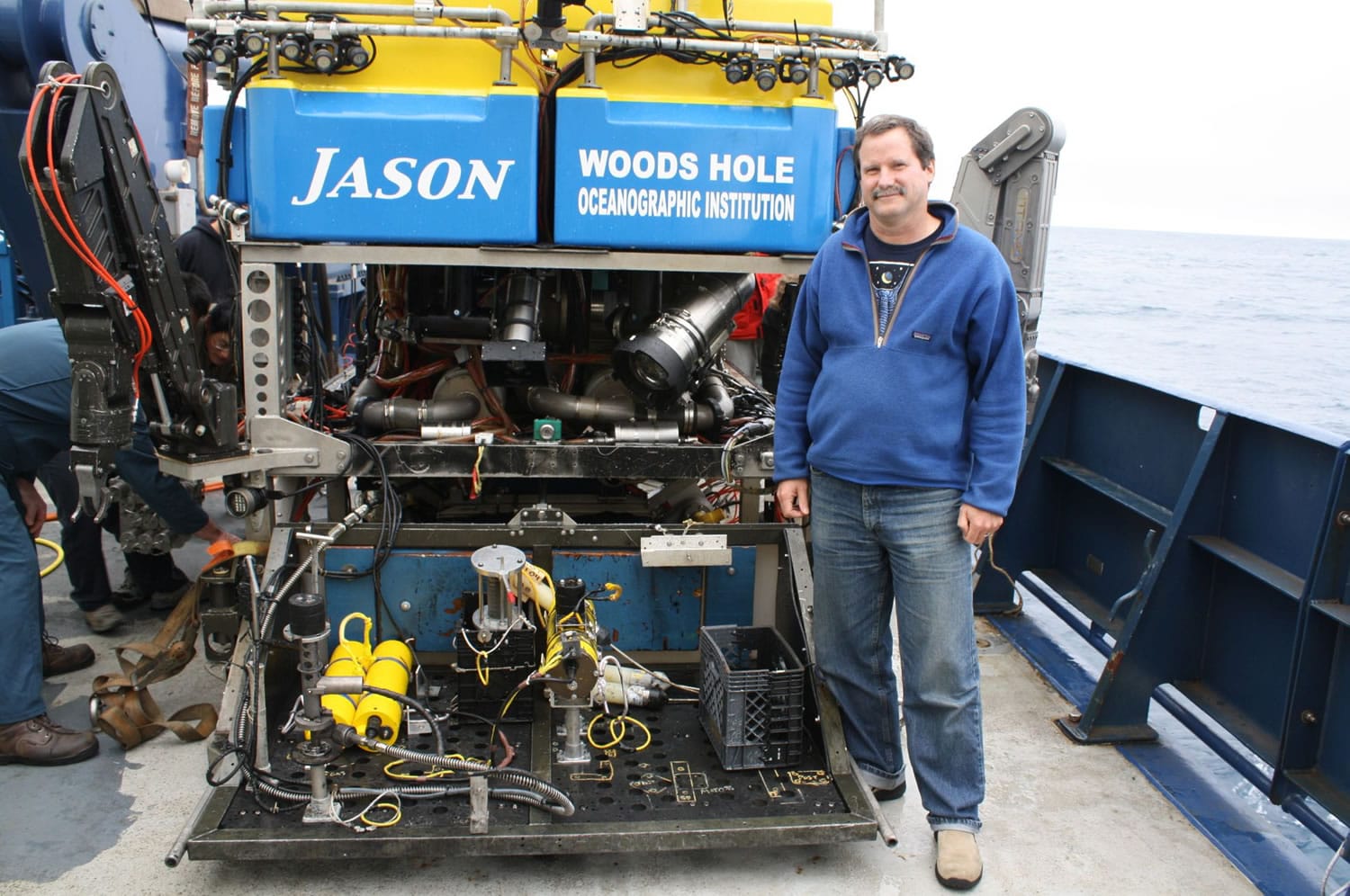 Former Vancouver resident Bill Chadwick, an Oregon State geologist and chief scientist on a recent research expedition, stands next to the remotely operated submersible vehicle known as Jason.