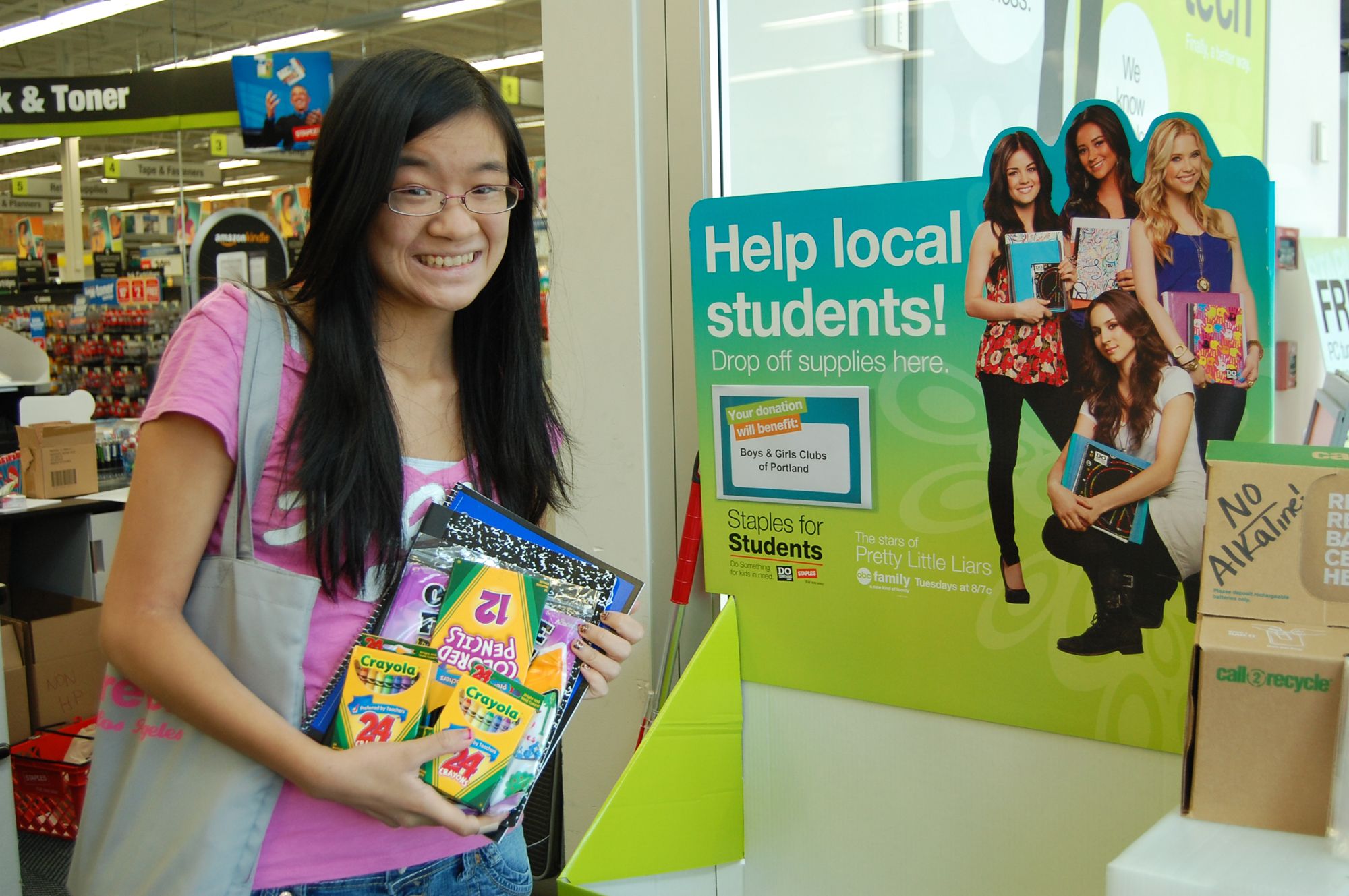 Rachel Lee collects school supplies during the DoSomething.org scavenger hunt.