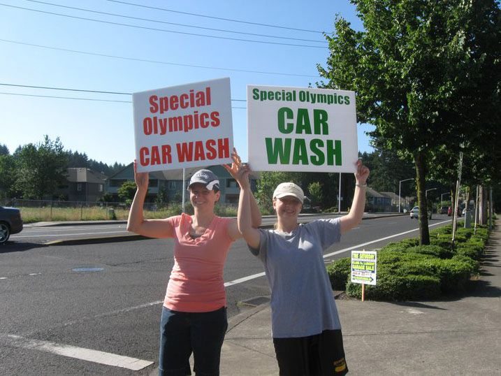 Landover-Sharmel: Clark County Special Olympics athlete Rachel Akins, right, and her mom, Christi Kunze, work at a car wash to raise money for jerseys for two new Special Olympics softball teams