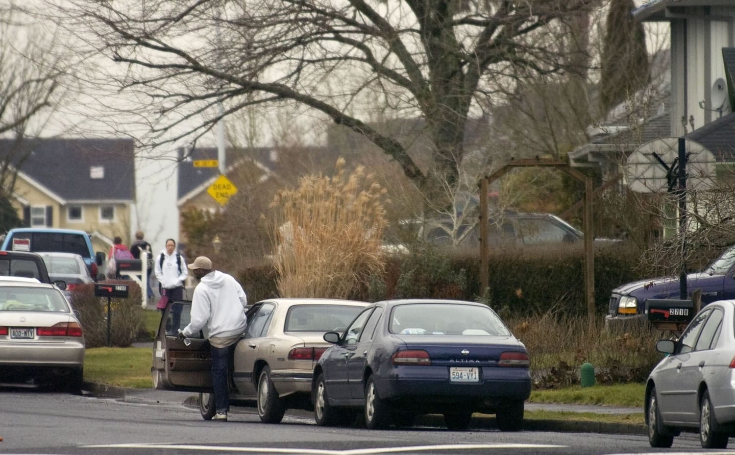 This photograph from 2008 shows how WSU Vancouver students used to park on residential streets rather than paying to park on campus, a trend that generated so many complaints commissioners banned daytime parking on weekdays.