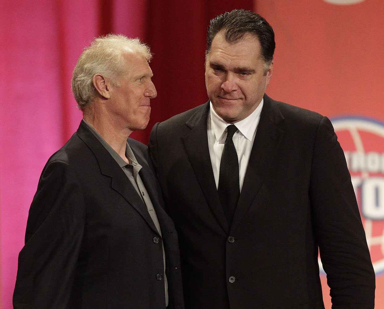 Arvydas Sabonis, right, walks off the stage with his presenter Bill Walton at a Basketball Hall of Fame enshrinement ceremony in Springfield, Mass., last Friday.