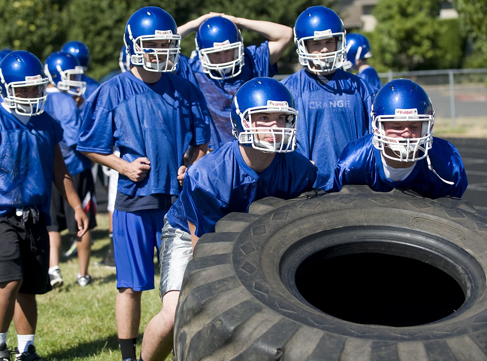 Mountain View High School football players take part in a unique drill during the first day of practice on Wednesday