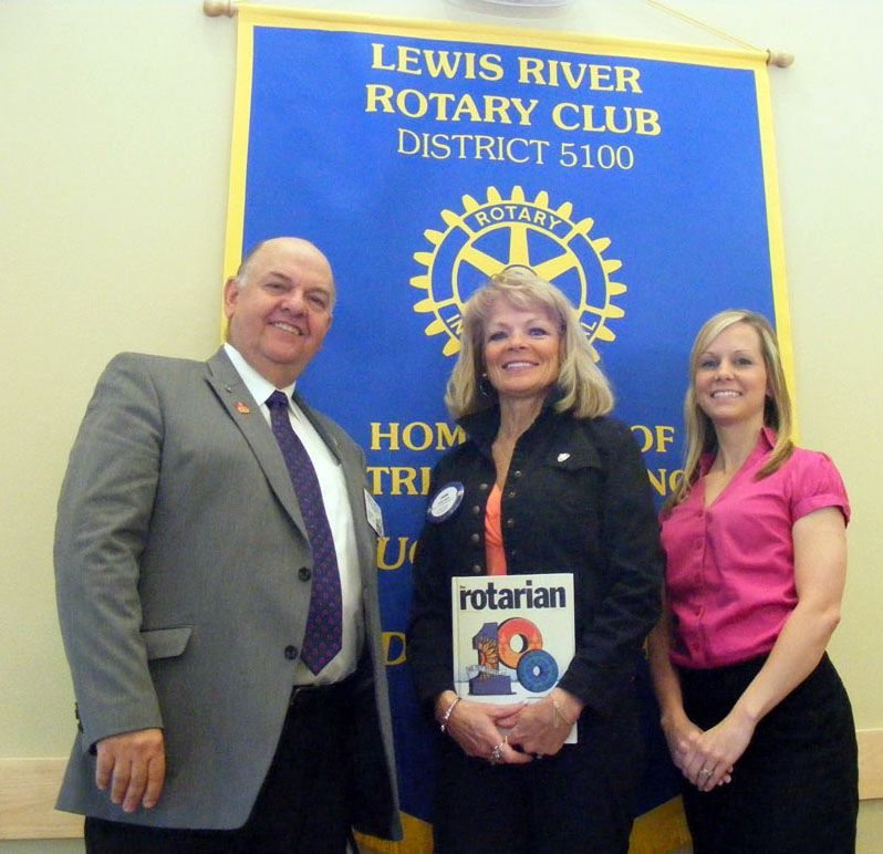 Battle Ground High School Assistant Principal Jann Byrd, center, received the Transformer Award from the Lewis River Rotary.
