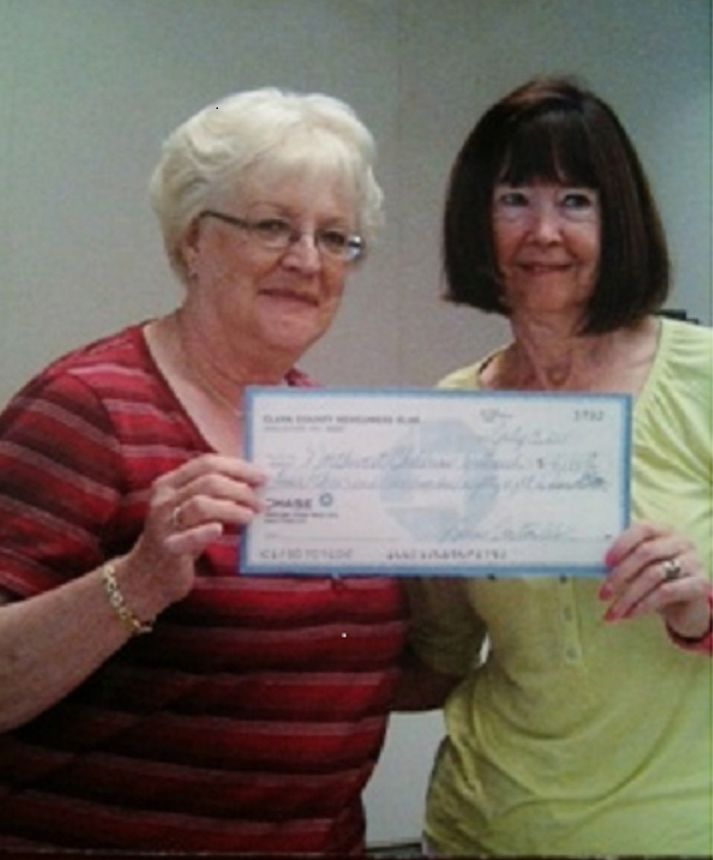 Yvonne Wright, left, of the Clark County Newcomers Club, presented a check for more than $4,000 to Mary Oldham of the Northwest Children's Outreach.
