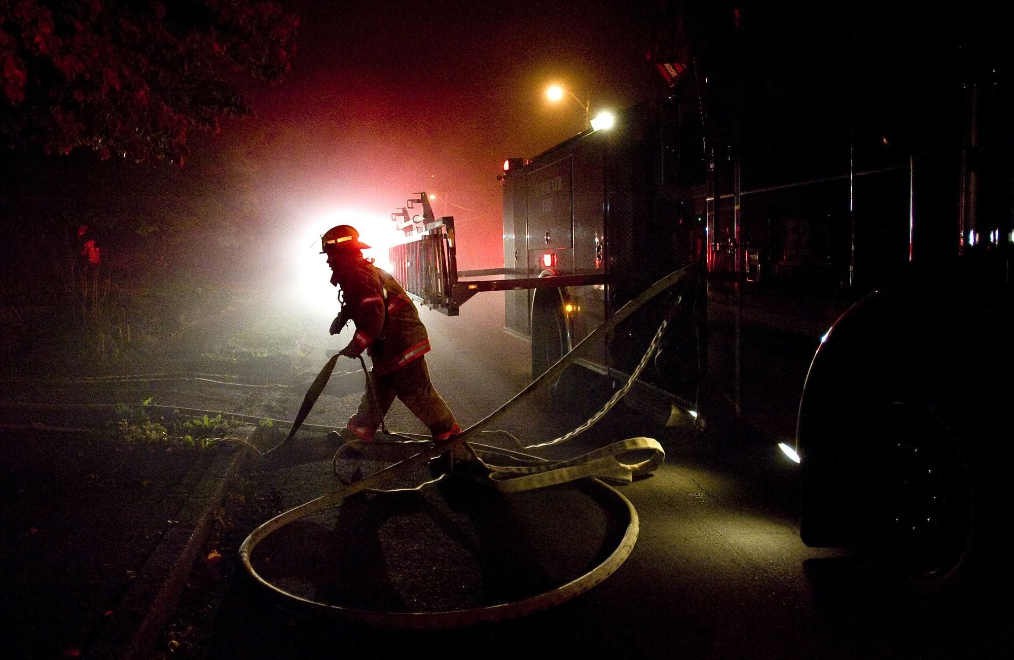 Firefighters deal with an attic fire inside a home on N.W.