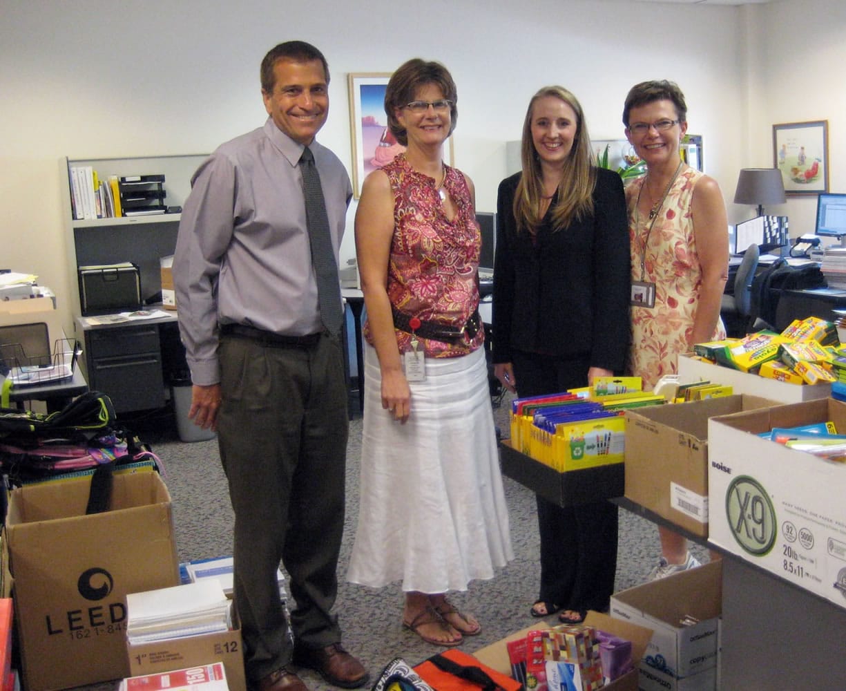 Alan Hamilton, from left, First Independent Bank senior manager of community investments, Jan Redding, Foundation for Vancouver Public Schools assistant director, Susan DeRenzo, First Independent Bank financial adviser, and Tara Taylor, Foundation for Vancouver Public Schools executive director, are surrounded by school supplies collected by the Foundation for Vancouver Public Schools.