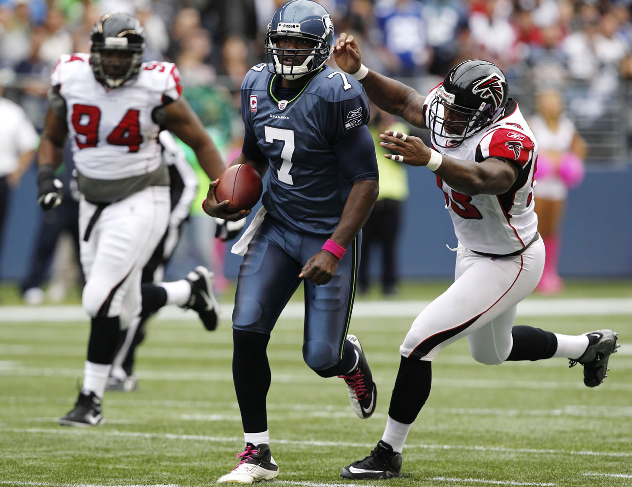 Tarvaris Jackson (7) was much more comfortable running the no-huddle offense in the second half.