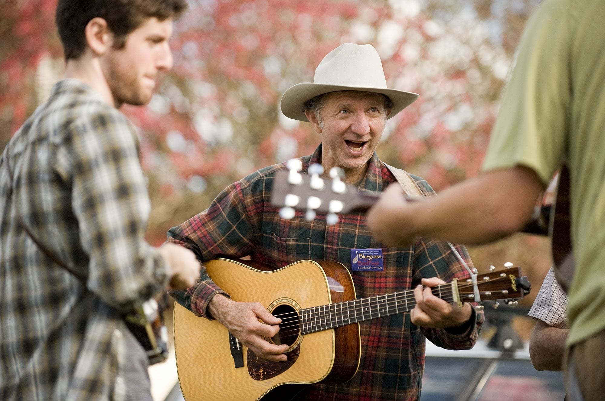 Fred Coates, center, jams with new friends at BirdFest and Bluegrass Saturday in Ridgefield.