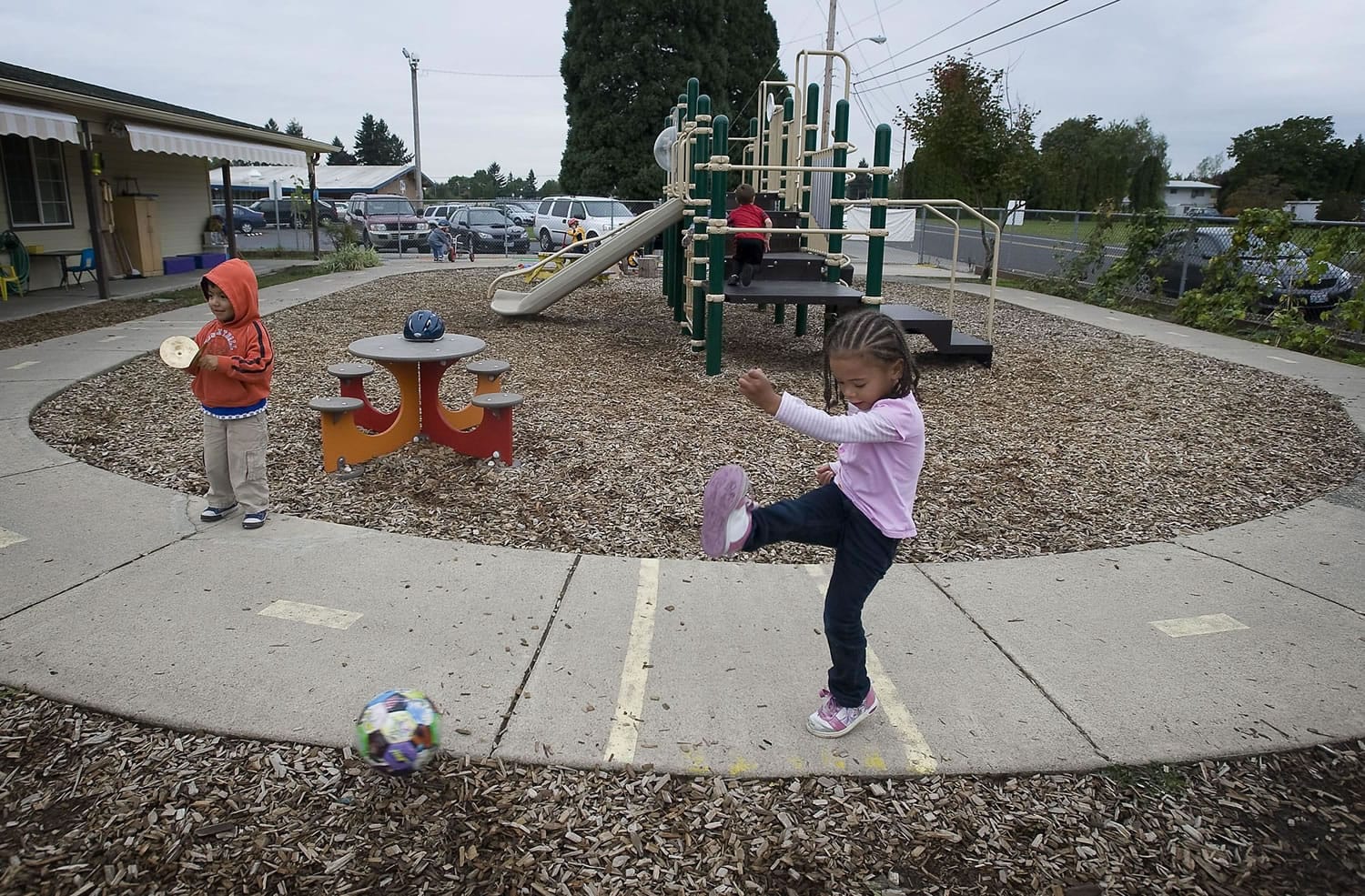 Chanelle Paschal, 4, kicks a soccer ball during outdoor activity time at Ellsworth Head Start Friday.