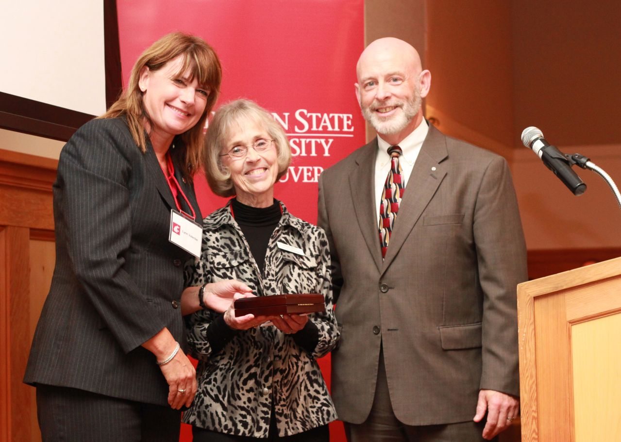 Salmon Creek: Barbe West, center, executive director of the Free Clinic of Southwest Washington, accepts the 2011 WSU Vancouver Community Award of Distinction for Community Partnership.