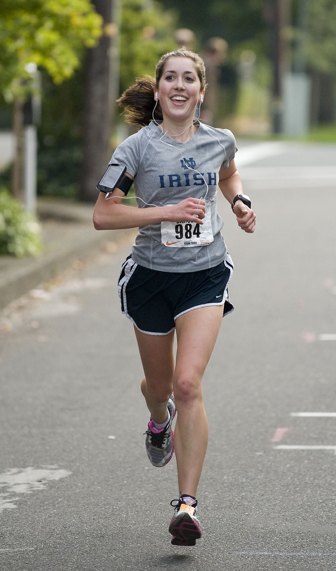 Carolyn Green of Ridgefield, a sophomore at Notre Dame, runs to victory Sunday in the Girlfriends Half Marathon in Vancouver.
