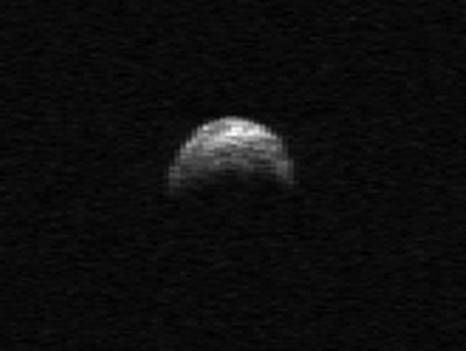 This image made from radar data taken in April 2010 by the Arecibo Radar Telescope in Puerto Rico and provided by NASA/Cornell/Arecibo shows asteroid 2005 YU55. The asteroid, bigger than an aircraft carrier, will dart between the Earth and moon Tuesday -- the closest encounter by such a huge rock in 35 years. But scientists say not to worry.