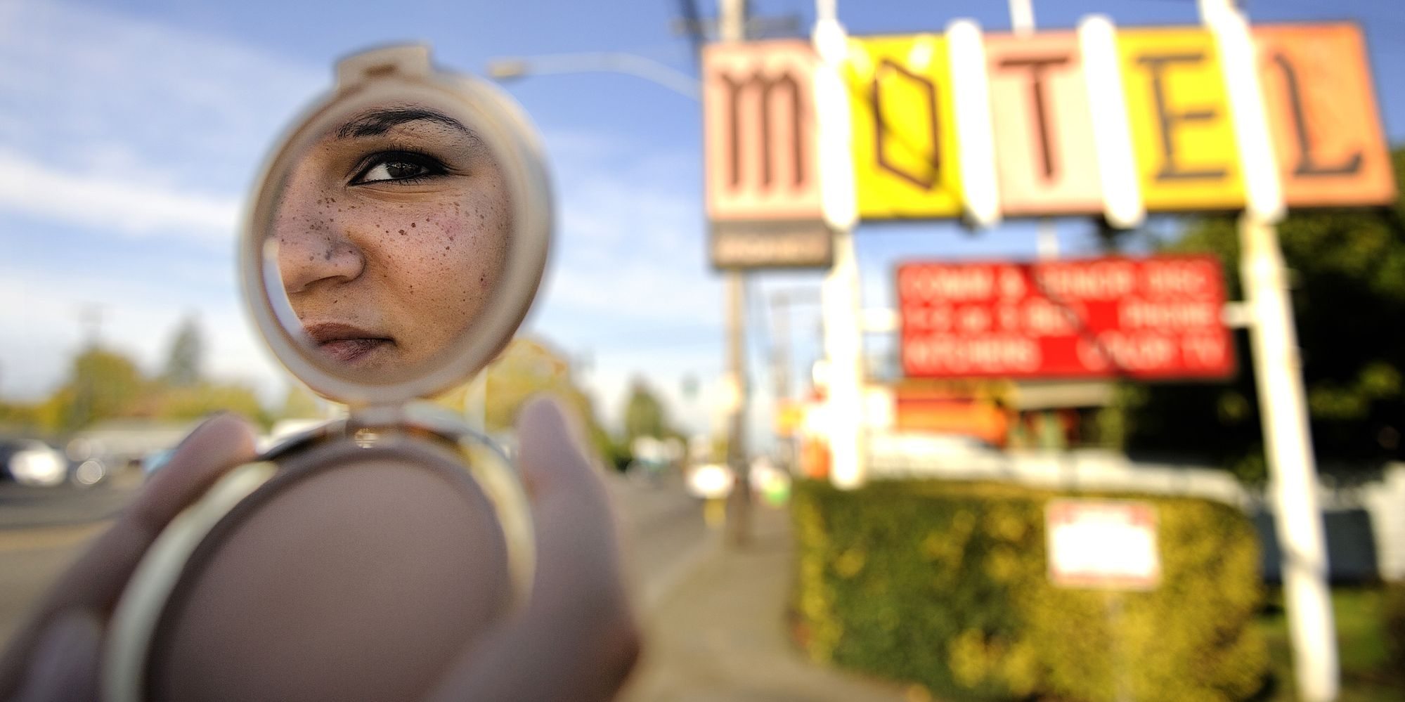 &quot;Jennifer,&quot; a Clark County teen formerly involved in prostitution, watches over Portland's Southeast 82nd Avenue.