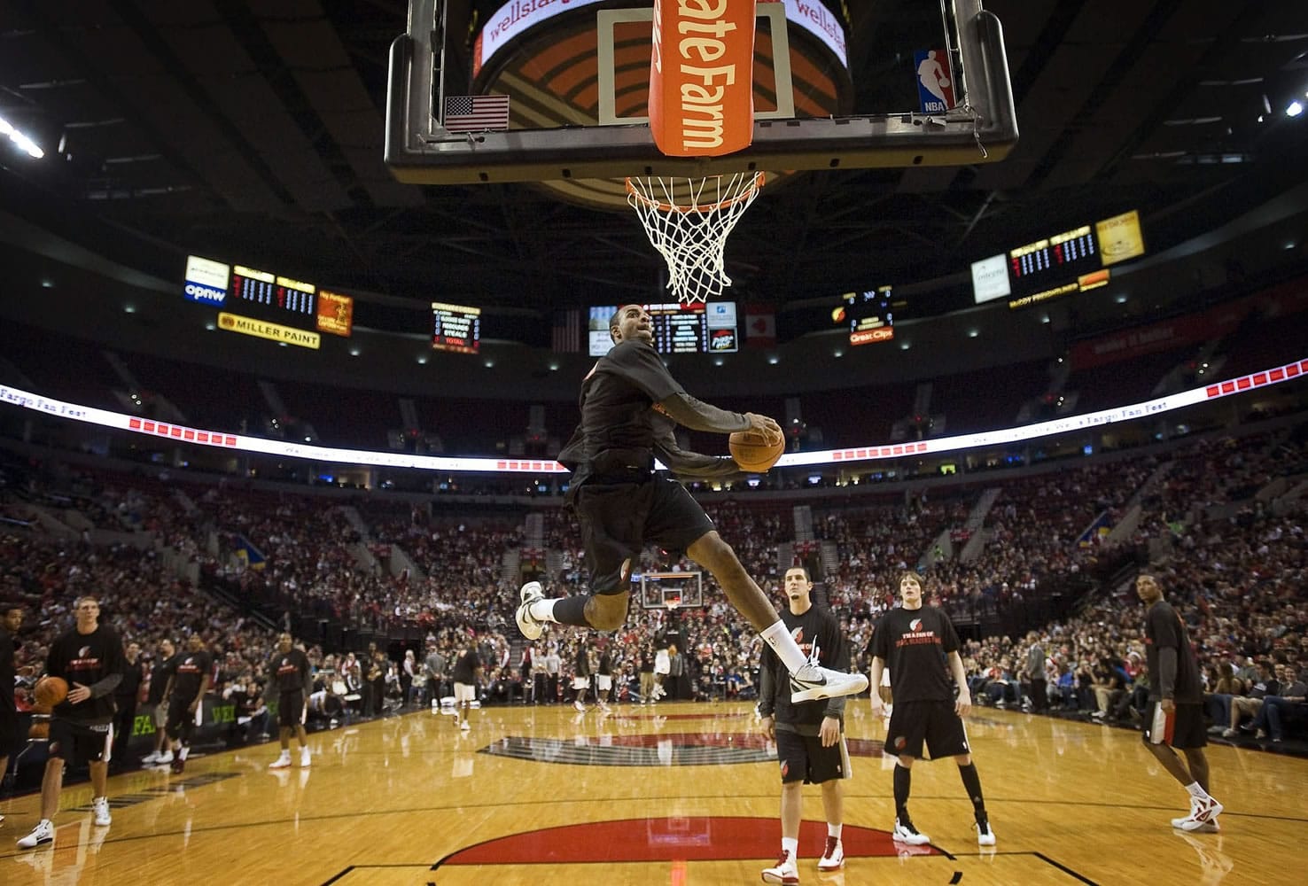 Elliot Williams dunks the ball during warm-ups before a scrimmage during Blazer Fan Fest at The Rose Garden on Friday.