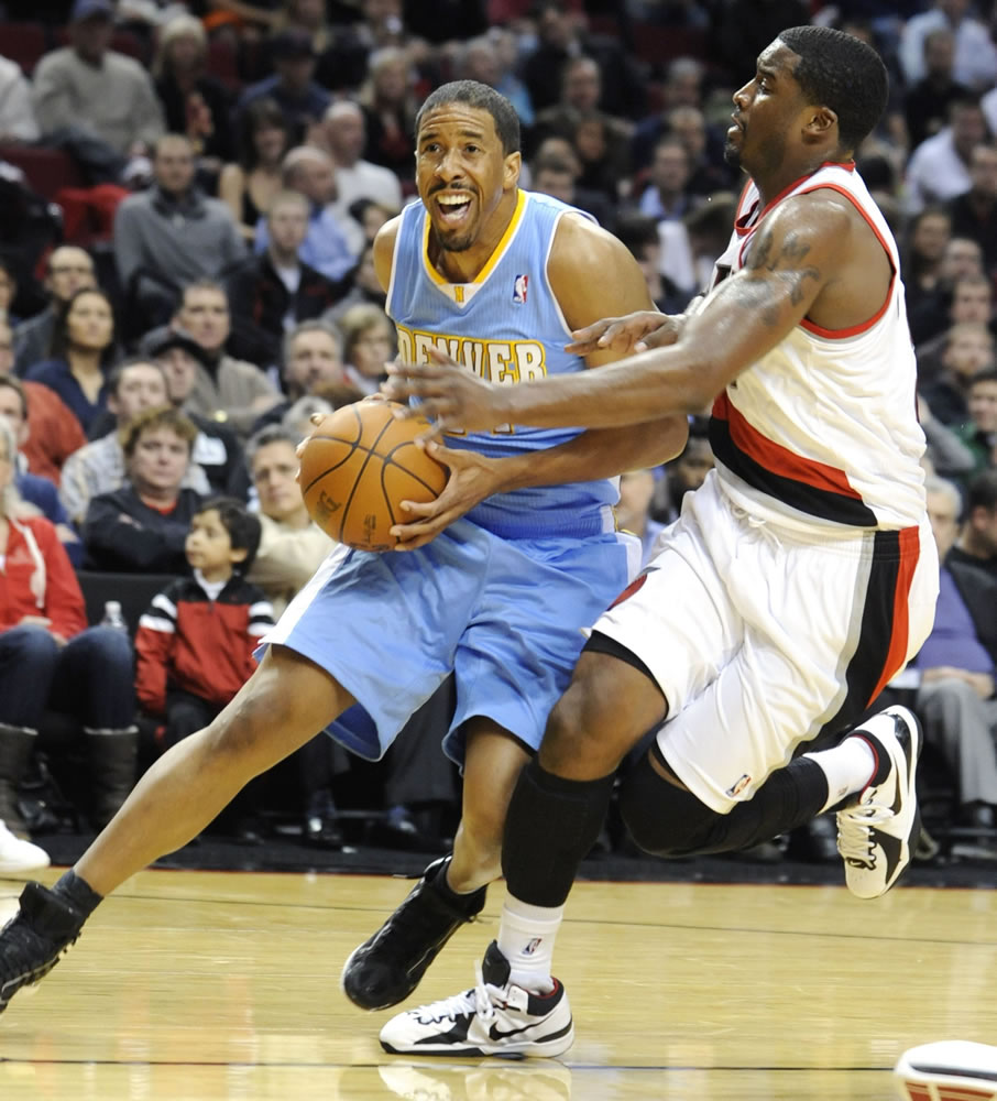 Denver Nuggets' Andre Miller (24) drives against Portland Trail Blazers' Wesley Matthews (2) during the first half of an NBA basketball game in Portland, Ore., Thursday, Dec 29, 2011.