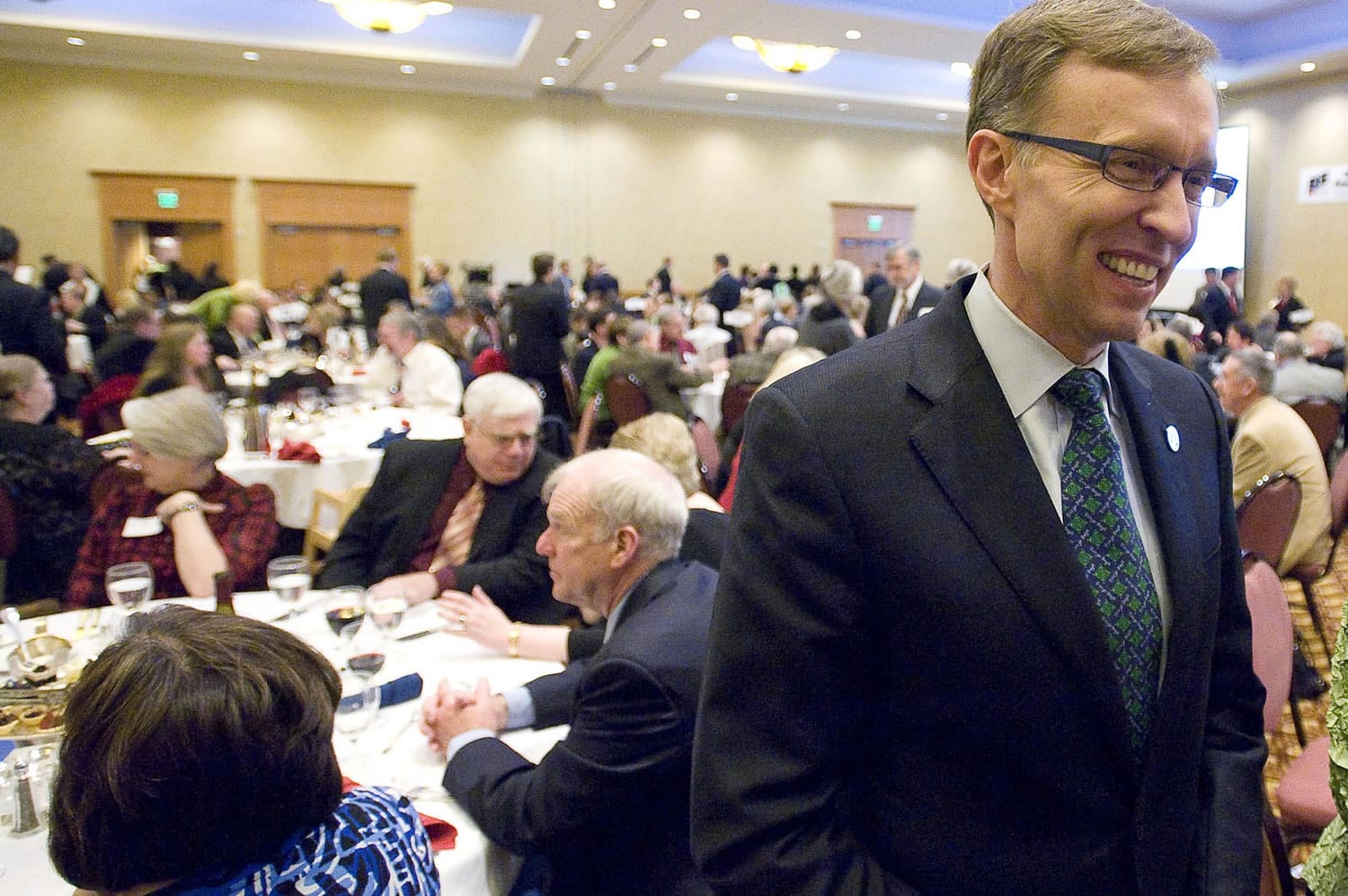 Attorney General and gubernatorial candidate Rob McKenna works the room before delivering the keynote speech at the annual Lincoln Day dinner at the Hilton Vancouver Washington on Saturday.