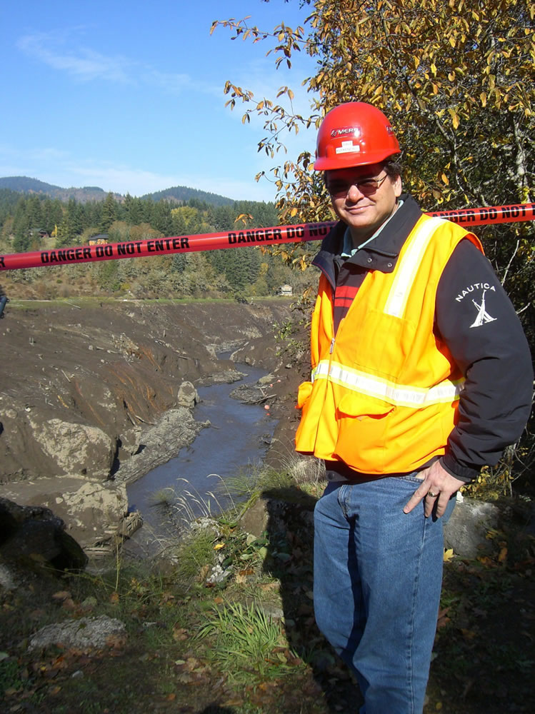 Dale Kuykendall, project manager for JR Merit, the Vancouver-based company hired to decommission Condit Dam, shows off Nov.