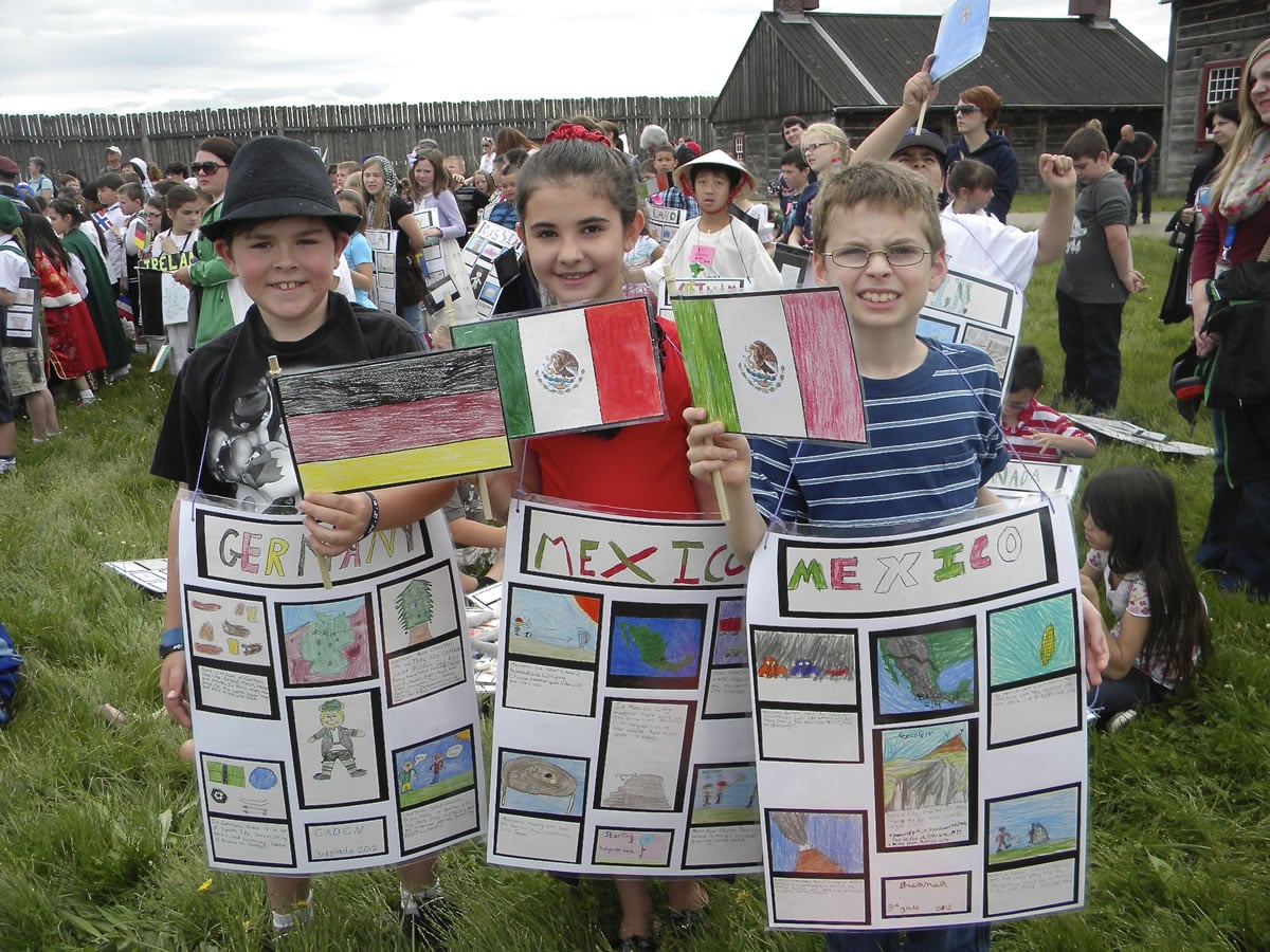 York Elementary School third-graders, from left, Caden McCray, Sterling Shenault and Brennan Owens, all 9, show their German and Mexican heritage.