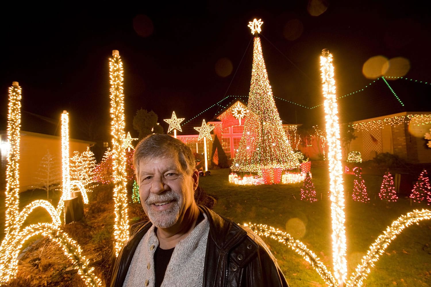 John Pfeiffer's Christmas light display at his Camas home has 55,000 lights sequenced to 17 Christmas songs.