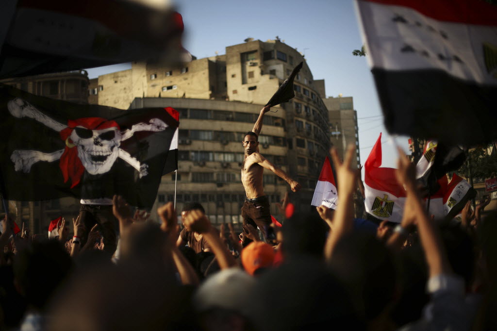 Protesters gather after the verdict in the trial of former President Hosni Mubarak in Tahrir Square in Cairo, Egypt, on Saturday.