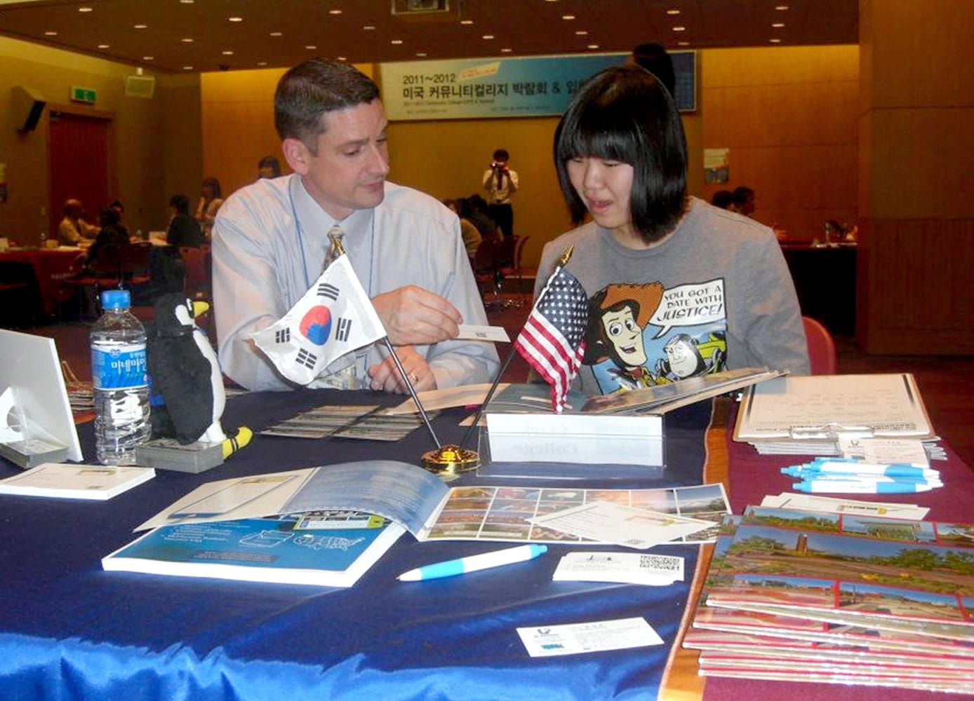 Clark College Bill Belden, Clark College vice president of student affairs, visits with a prospective student in South Korea.
