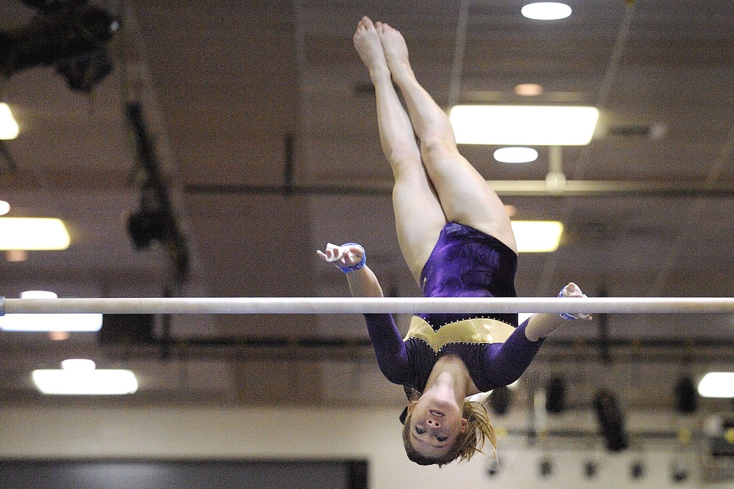 Jennifer DeBellis of Columbia River High School scores a 9.20 on the uneven bars at the WIAA state gymnastics competition on Friday.