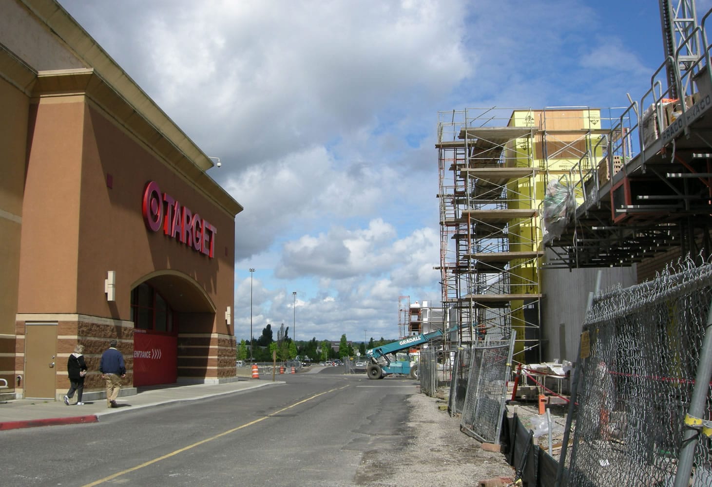 An older Target store at the Jantzen Beach Center mall, at left, will be replaced by a larger store now under construction, right, and expected to open in October with fresh groceries, such as wrapped meat and produce.