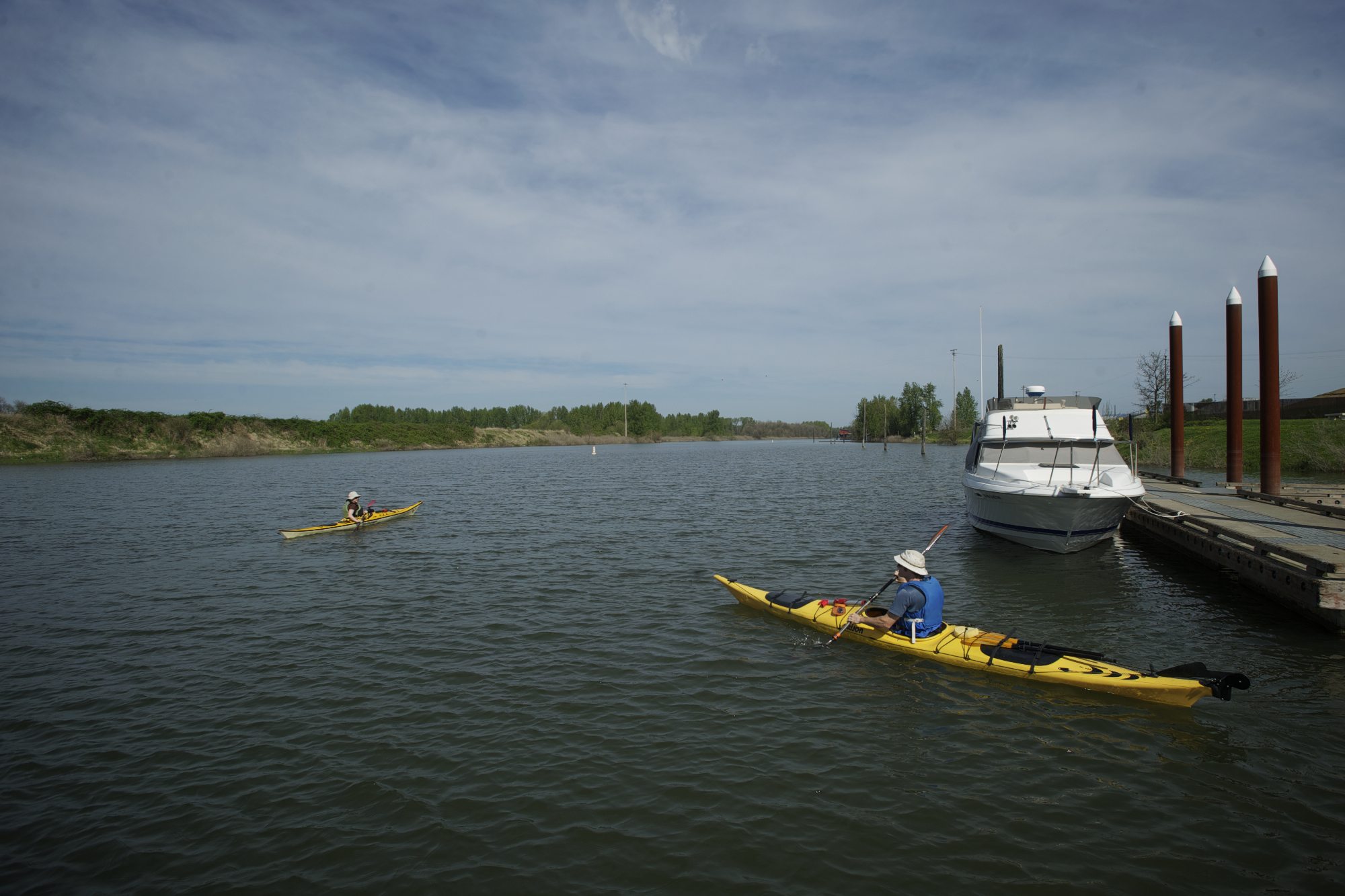 Michele Megregian, left, and her husband, Ryan Allen, of Portland, start off on a short kayak trip Monday at the Port of Ridgefield.