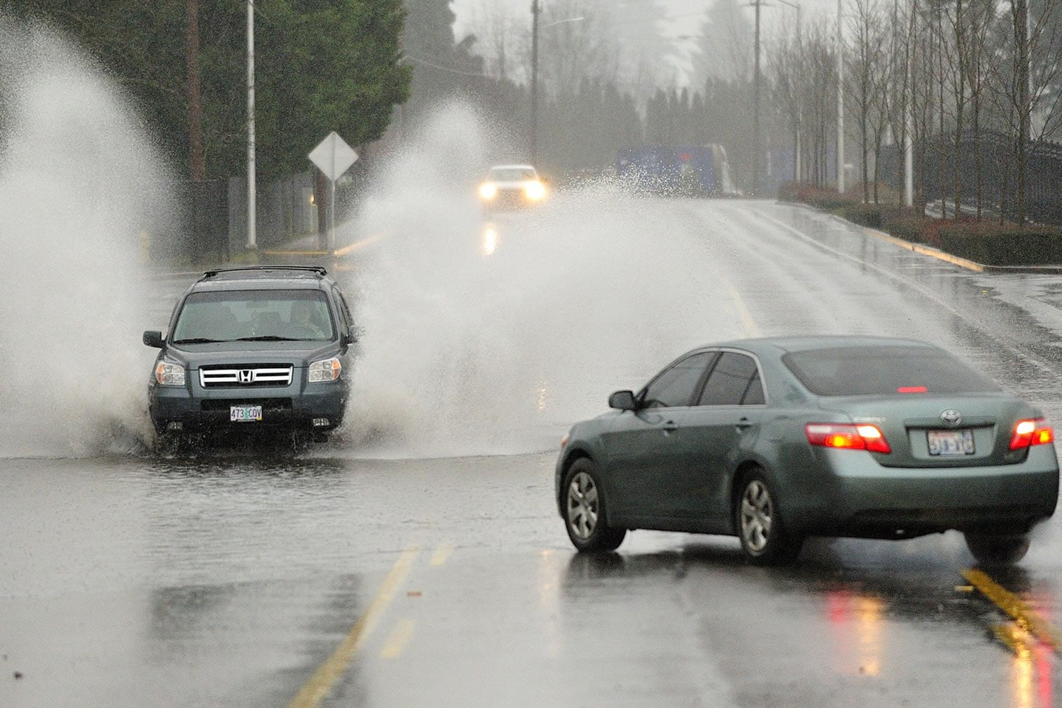 Motorists on Fruit Valley Road encounter high water Thursday in Vancouver.