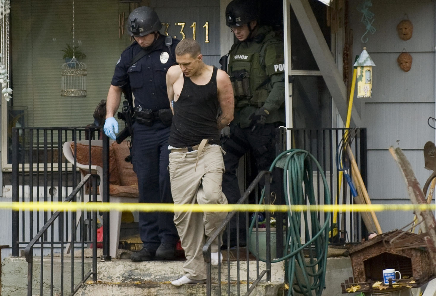 A suspect in a bank robbery is taken into custody after a 3 hour long standoff at 3311 E.