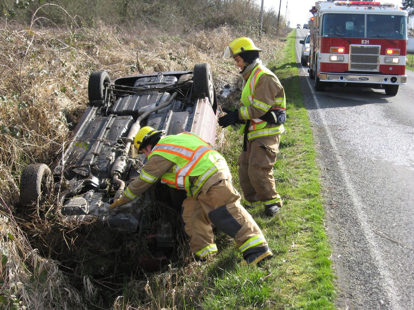 A 19-year-old was unharmed Wednesday morning after her sedan landed in a Hockinson ditch.