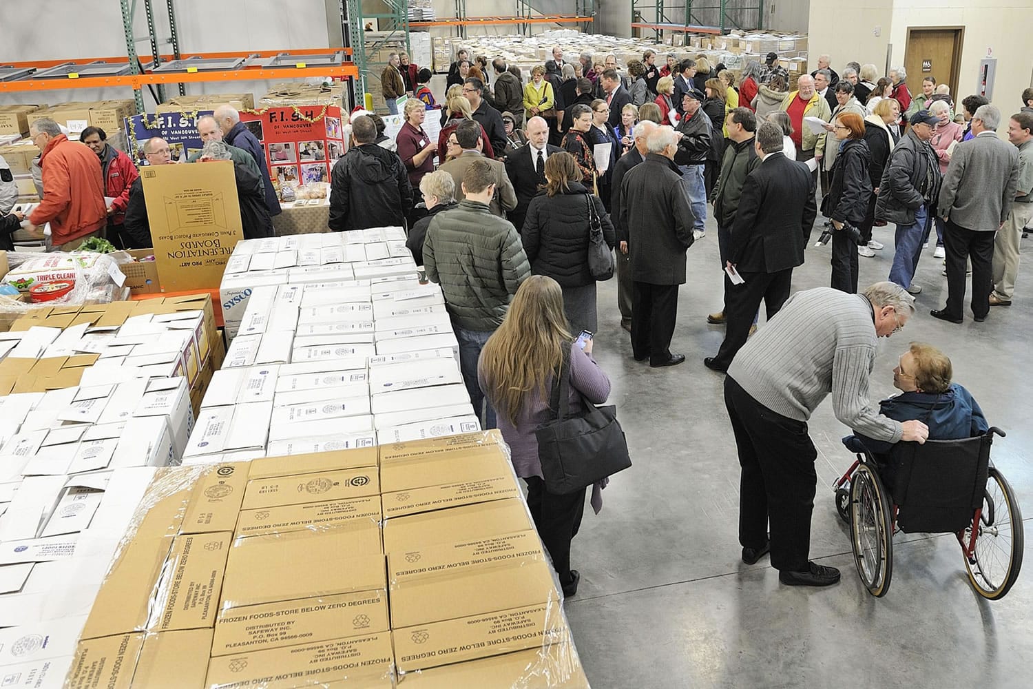 It was a little hard to find space to walk inside the new Clark County Food Bank warehouse and distribution center on Tuesday -- the floor was so full of visitors and Walk &amp; Knock donations.