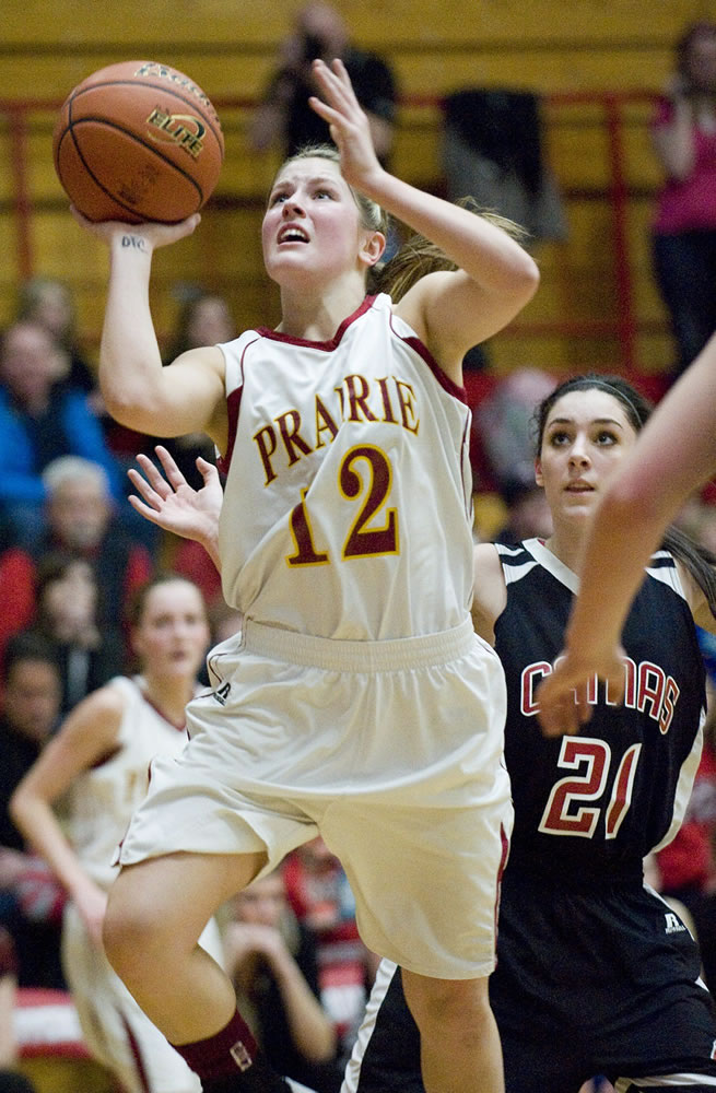 Prairie's Cori Woodward goes up for two of her 13 points against Camas in Friday's 3A district championship game at Fort Vancouver High School.