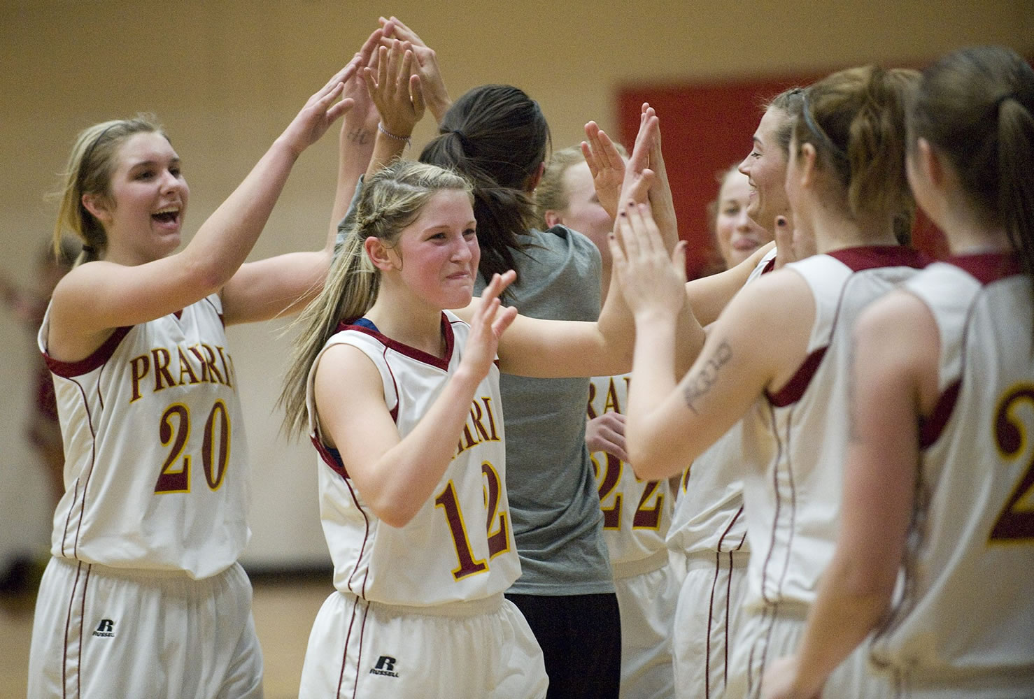 Prairie celebrates after beating Camas to win the championship at the  GSHL 3A Basketball Tournament at Fort Vancouver High School, Friday, February 10, 2012.