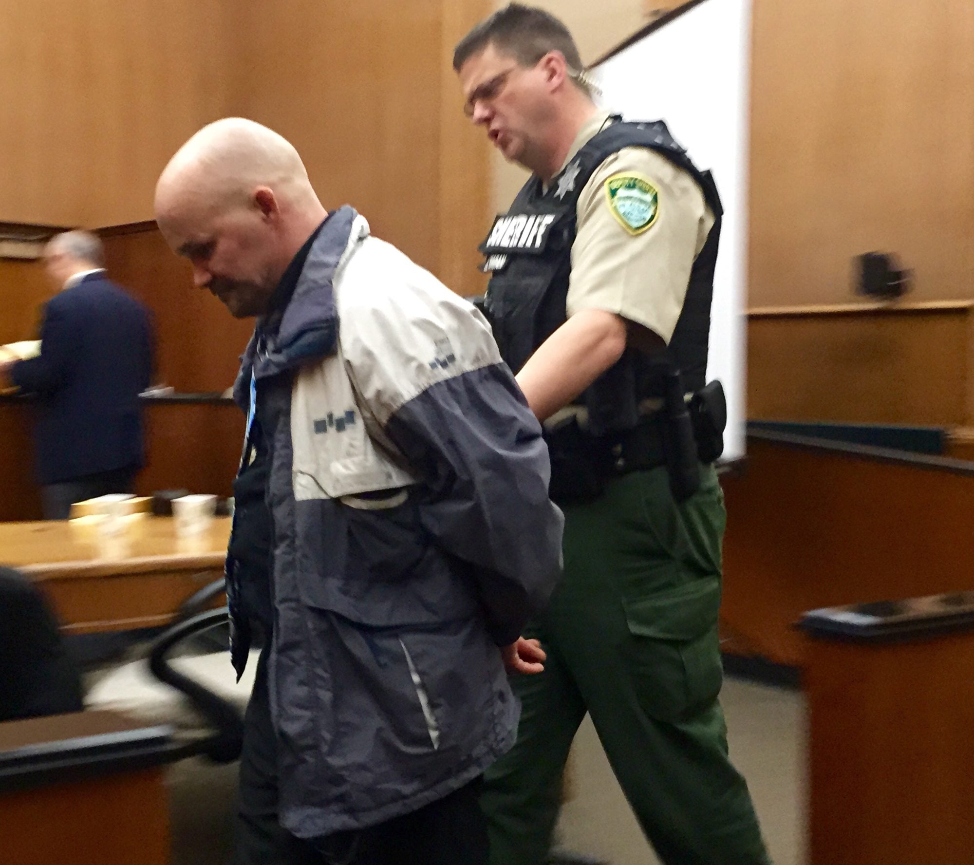 Ronald Ahlquist is taken into custody Thursday evening after a Clark County Superior Court jury found him guilty of manslaughter, identity theft and theft charges following a two-week trial.