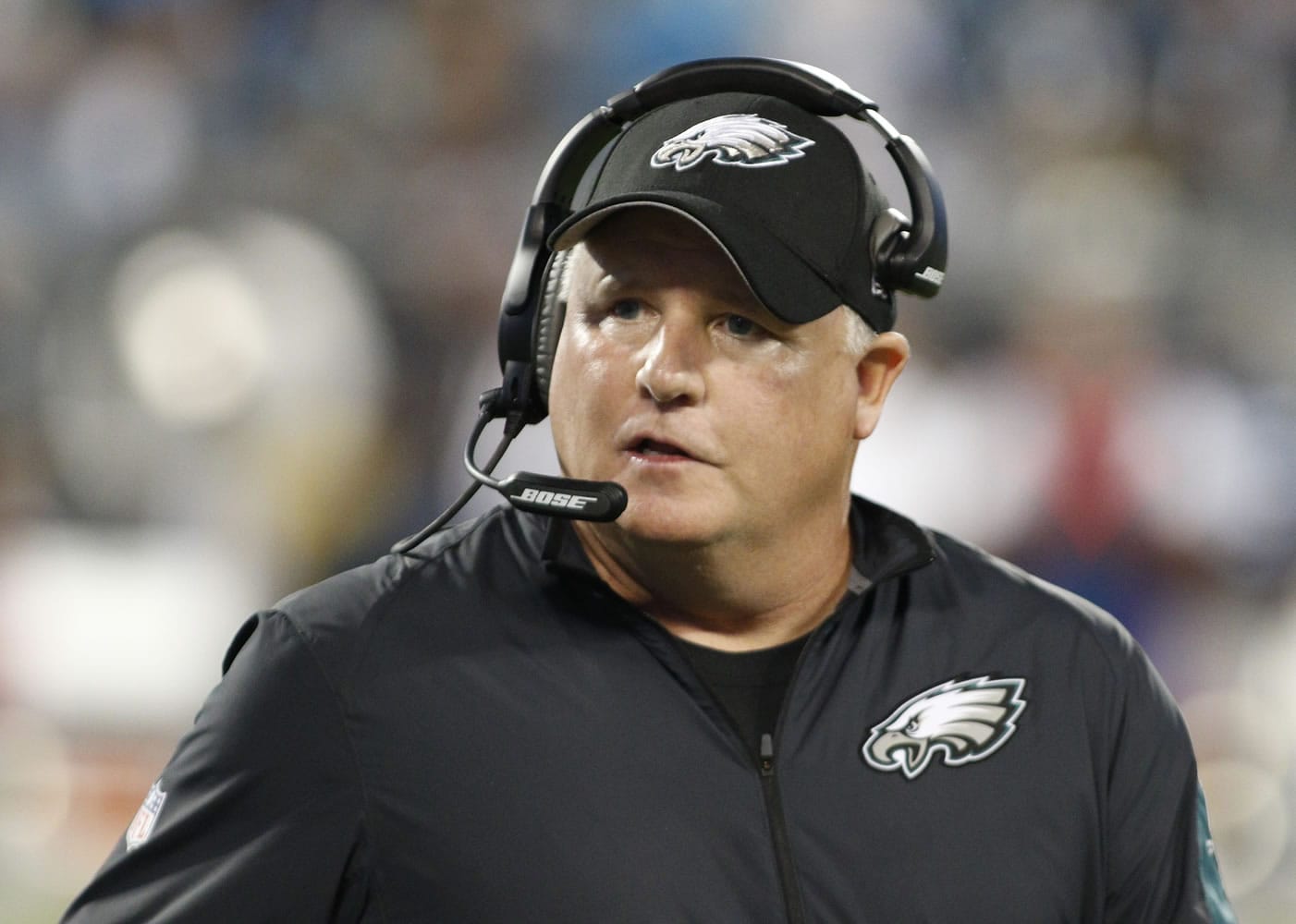 FILE - In this Oct. 25, 2015, file photo, Philadelphia Eagles head coach Chip Kelly watches the action from the sidelines in the first half of an NFL football game against the Carolina Panthers in Charlotte, N.C. The San Francisco 49ers have hired Chip Kelly as their new head coach. CEO Jed York announced the move on Twitter and so did the team.