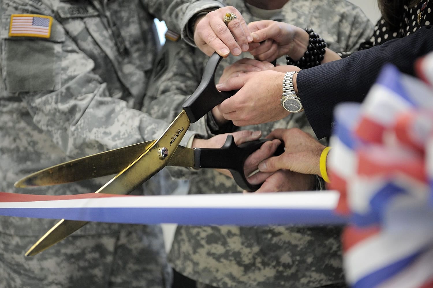 Military officials and community leaders team up for a Veterans Day ribbon cutting at the new Armed Forces Reserve Center near Fourth Plain Boulevard and Ward Road on Nov.