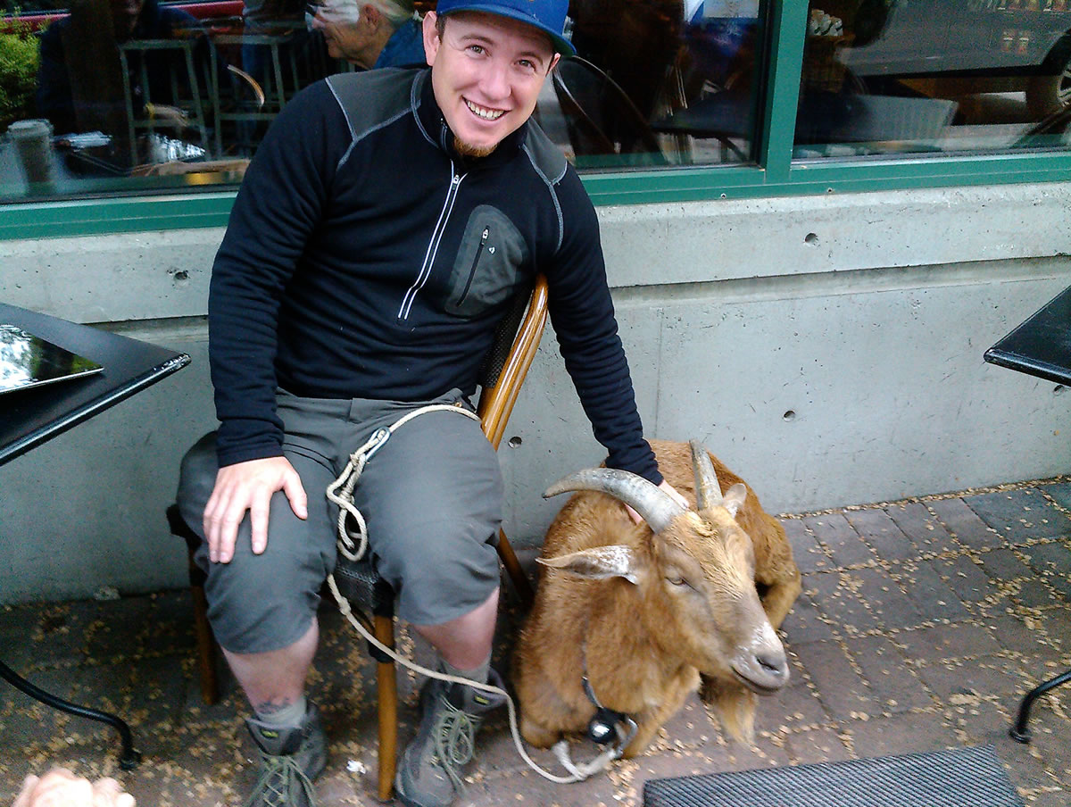 Steve Wescott and his goat, LeeRoy, stop for a coffee at the Esther Short neighborhood Starbucks on May 30.