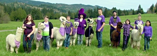 La Center: Both the students and their llamas from the Llama 101 4-H Club wore purple on &quot;Purple Up Day&quot; on April 13 to show their support for Operation Military Kids. Llama names in parentheses.
