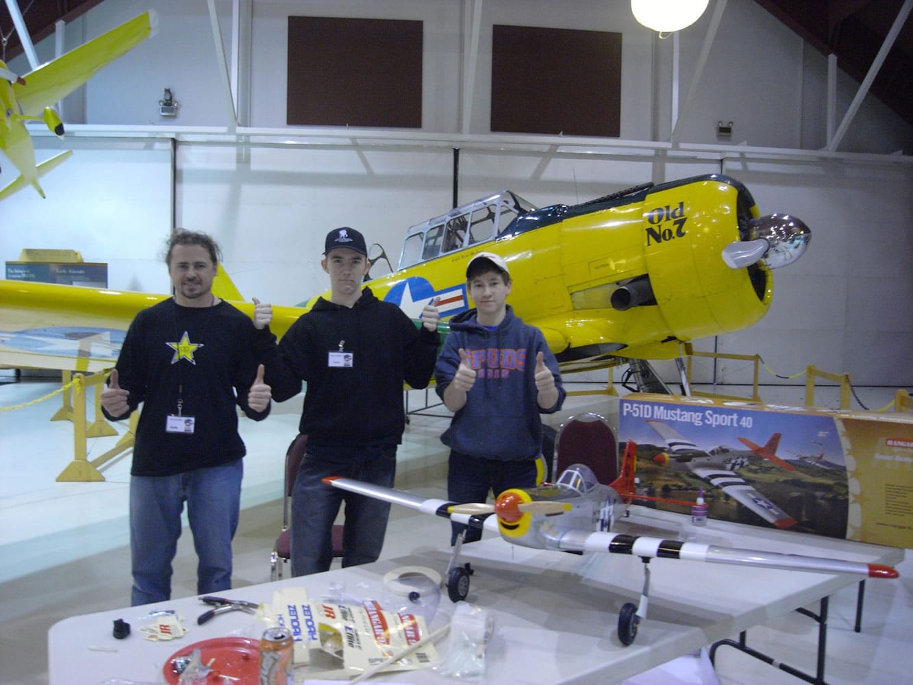 Hudson's Bay: Joshua Staley, left, airframe and power plant mechanic, Jason Brown, junior volunteer, and Carter Strader, Academy of Model Aeronautics member built a Red Tail model that will be part of the Tuskegee Airmen display at the Pearson Air Museum.