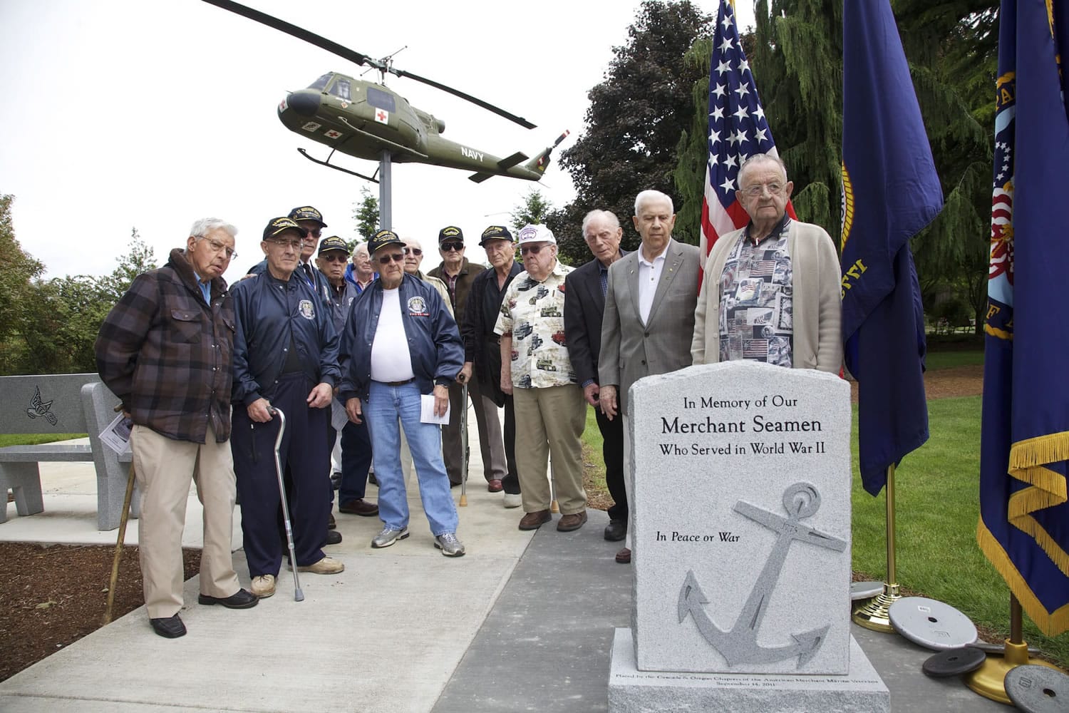 Thirteen former Merchant Marine sailors gather Wednesday to remember the seamen lost in World War II.
