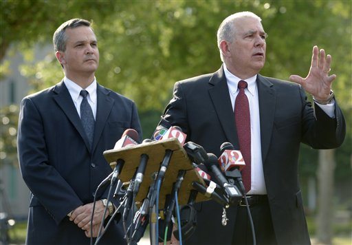Hal Uhrig, right, and Craig Sonner, former attorneys for George Zimmerman, speak to reporters during a news conference to announce that both attorneys had quit as Zimmerman's legal representatives in Sanford, Fla., Tuesday, April 10, 2012. Zimmerman is a neighborhood watch volunteer who authorities say fatally shot an unarmed teenager.
