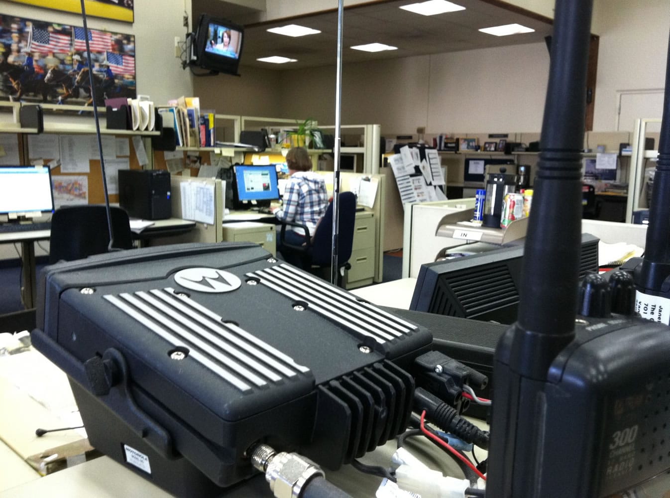 Police scanners chatter constantly in the newsroom.