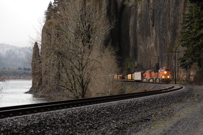 A 6,300-foot-long BNSF Railway train pulled by a GE-made Evolution diesel electric locomotive emerges from the Cape Horn tunnel on its way to Iowa in a TV commercial.