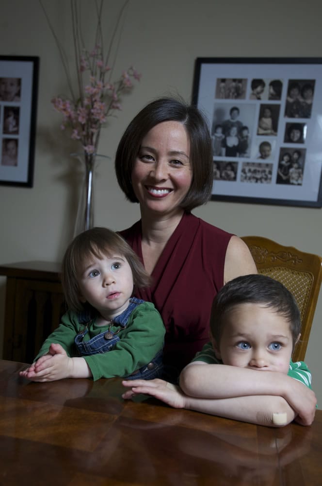 Aimee Fujioka, 38, poses for a portrait with her children Kiele Scribner, 2, left, and Kai Scribner, 4, at their Salmon Creek home.