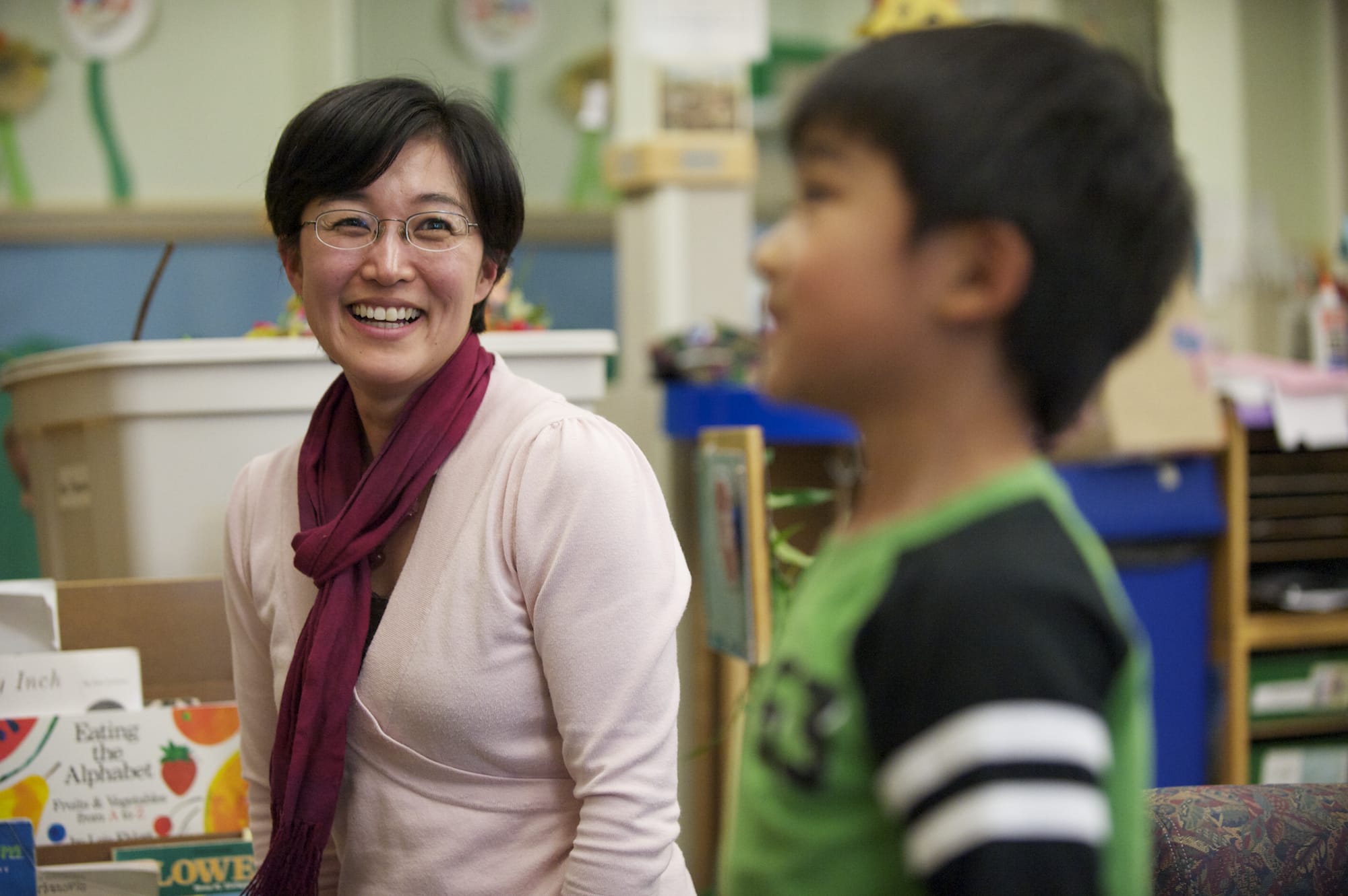 Yoshie Sano, assistant professor of human development at Washington State University Vancouver, interacts with her 5-year-old son, Reon Sano-Ochiai, at the WSUV Childhood Development Center.