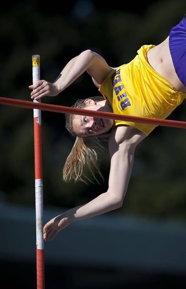 Columbia River's Jennifer DeBellis clears 11 feet on her way to a mark of 12 feet even to win the girls pole vault title.