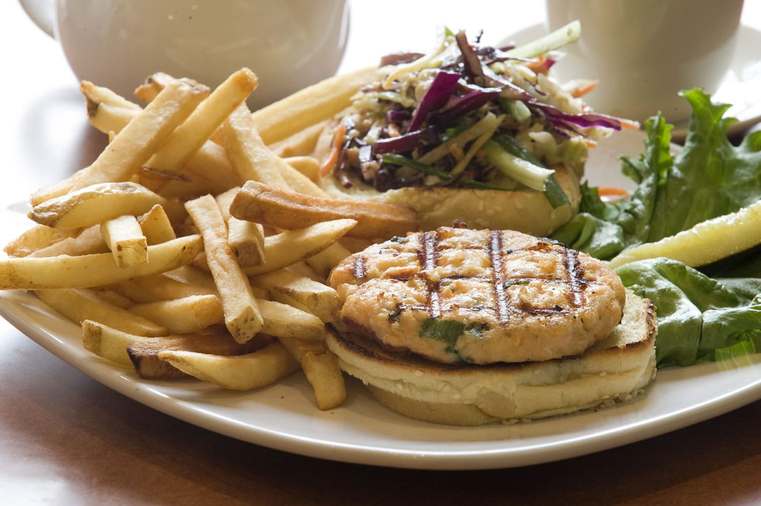 The Salmon Burger comes with Wasabi Mayonnaise and fries at Twin Dragons Asian Cafe at the New Phoenix Casino in La Center.