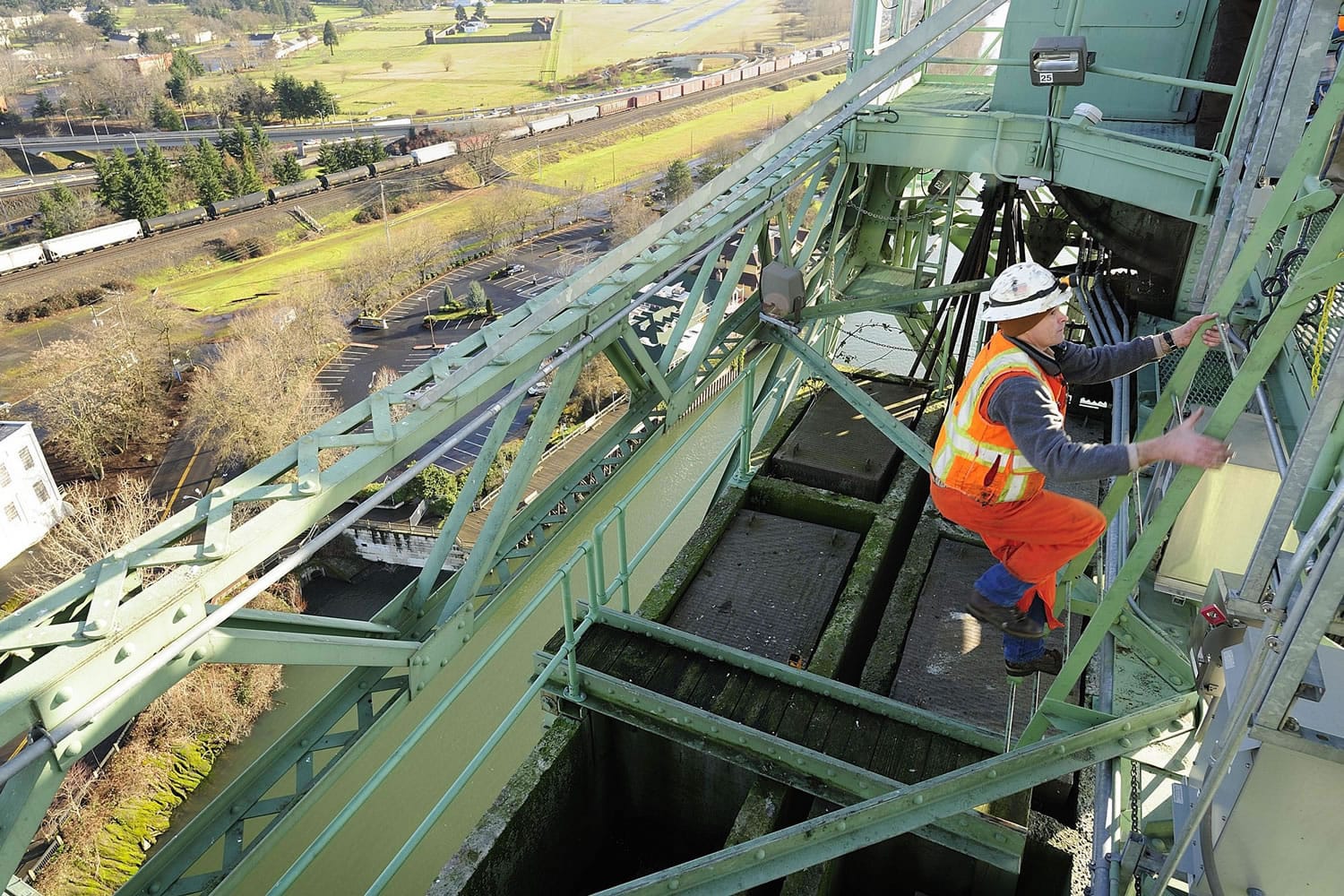 Marc Gross, bridge supervisor with the Oregon Department of Transportation, makes his way up the Interstate 5 Bridge lift tower last month.