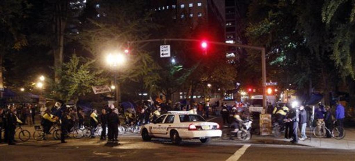 Main Street in downtown Portland was reopened after eight Occupy Portland protesters were arrested Thursday morning.